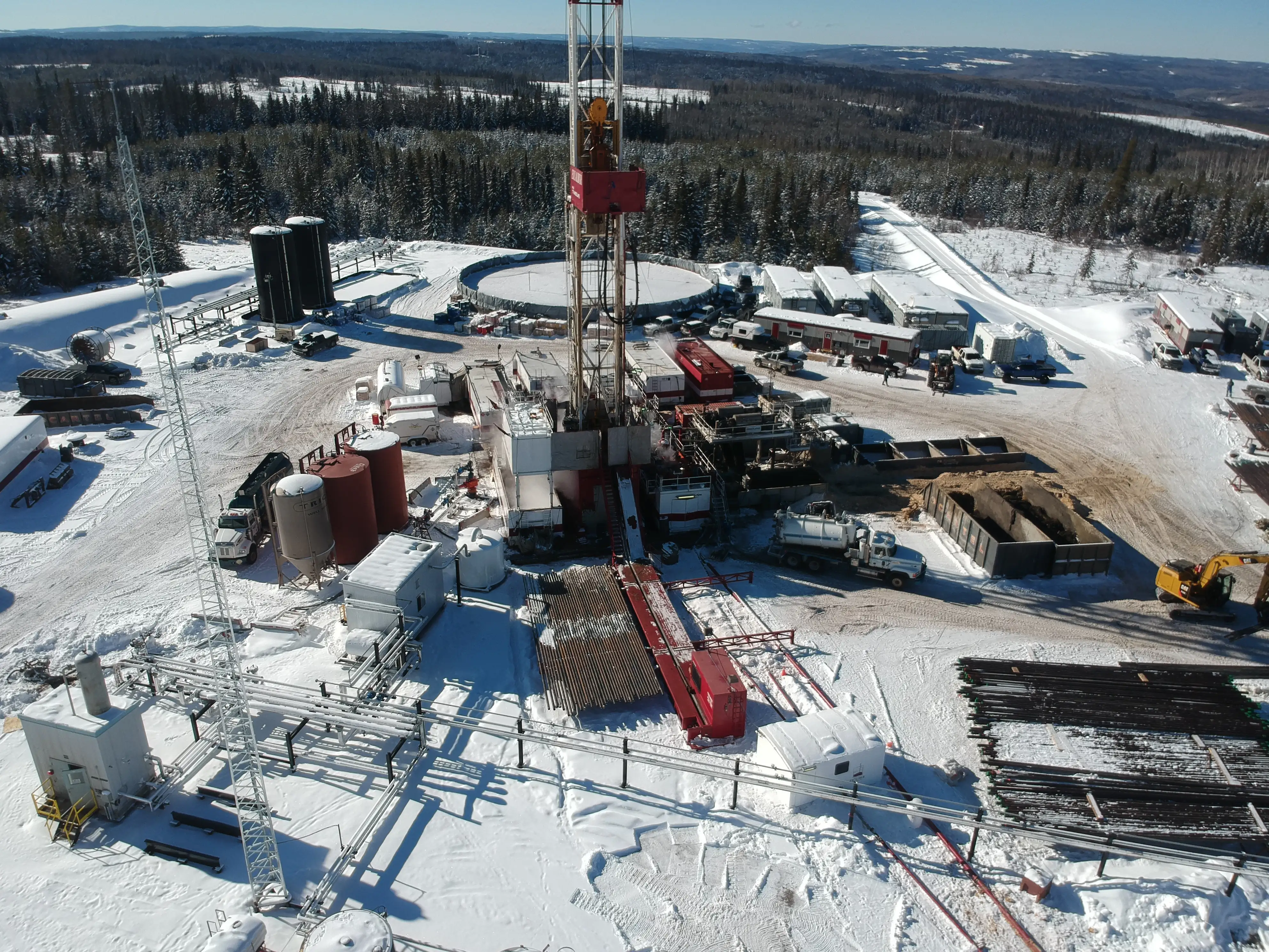 Aerial drone photo of a drilling rig on a WCSB lease